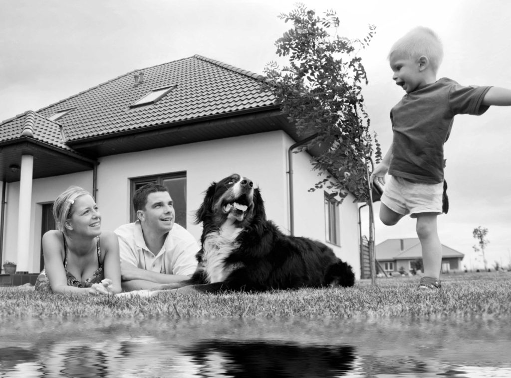 Happy family and house